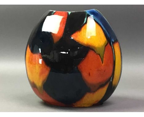 POOLE POTTERY VASE LATE 20TH CENTURY together with a small Moorcroft bowlthe vase 18cm highQty: 2The Moorcroft dish has a lot