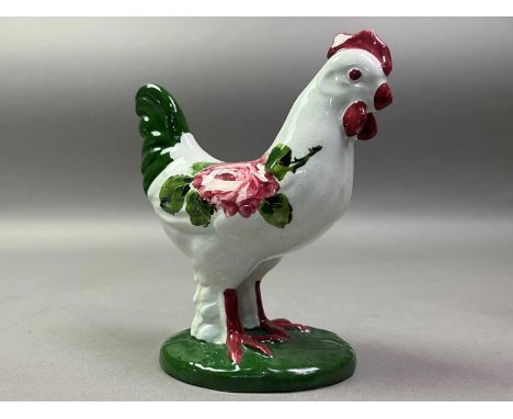 PLICHTA LONDON, THREE CERAMIC FIGURES IN THE MANNER OF WEMYSS comprising a pair of cockerels and a catthe cat 14cm highQty: 3