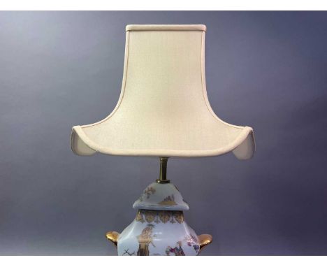 CHINESE TABLE LAMP with figural and gilt decoration, also with cream shade60cm high overallGood modern lamp with no obvious d