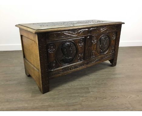 OAK DOWER CHEST MID 20TH CENTURY with hinged top, the front with two carved portrait panels depicting Queen Elizabeth II and 