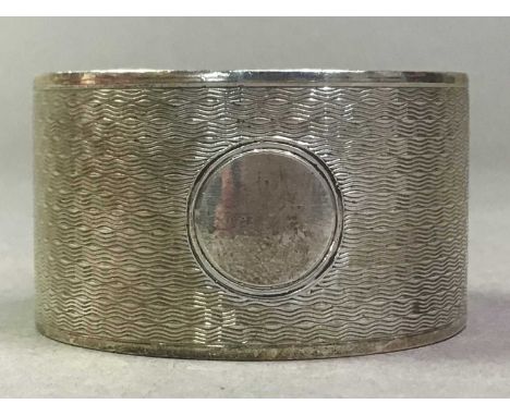 ART DECO SILVER NAPKIN RING AND OTHER MIXED BRASS AND PEWTER WARE the napkin ring marked for Birmingham, along with a pewter 