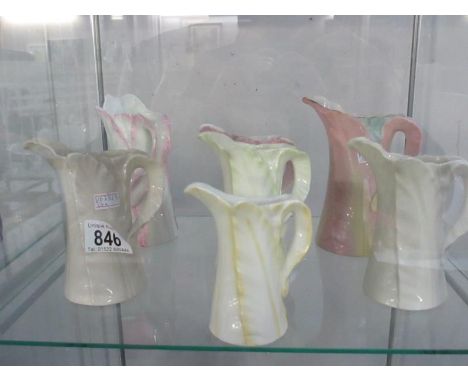 A collection of 7 Royal Worcester jugs