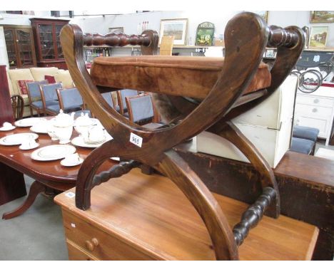 A dark wood stool