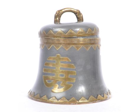 An early 20th century 1920s pewter lidded tea caddy in the form of a bell with chinese characters decorating body. Stamped Ma