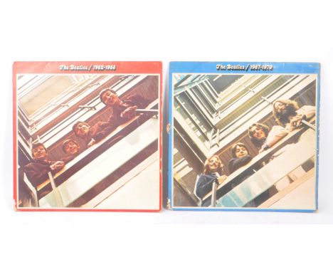 The Beatles - Two vintage 20th Century Beatles vinyl record albums to include the red 1962-1966 album and the blue 1967-1970 