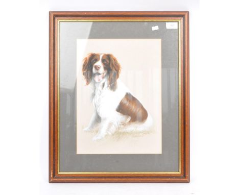A mid 20th century circa 1945 acrylic on board portrait of a spaniel dog painting. The painting depicting a sitting spaniel d