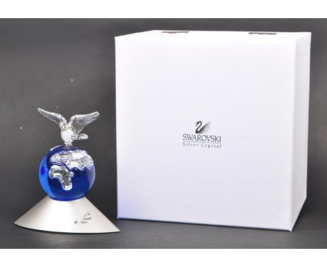 Swarovski - A boxed Millenium edition Swarovski Crystal Planet Vision 2000 ornamental planet decoration ( 238985 ). Designed 