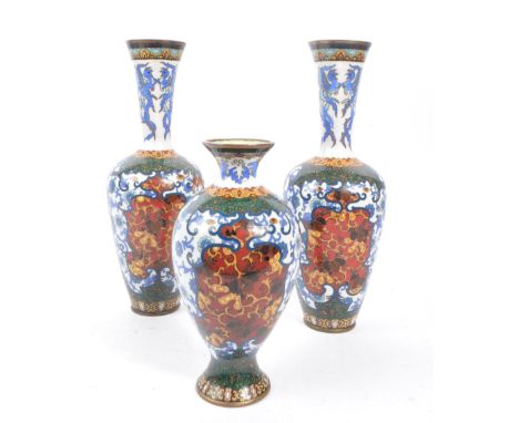 A collection of three 20th Century Japanese cloisonne enamel vases to include a pair of large cloisonne vases with decorative