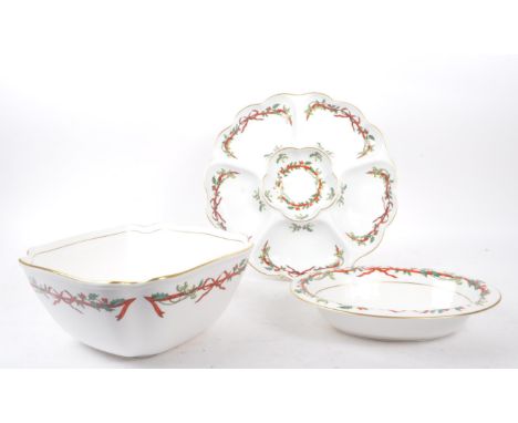 Royal Worcester - A collection of three bone china Royal Worcester pieces in the ' Holly Ribbons ' pattern, to include a larg
