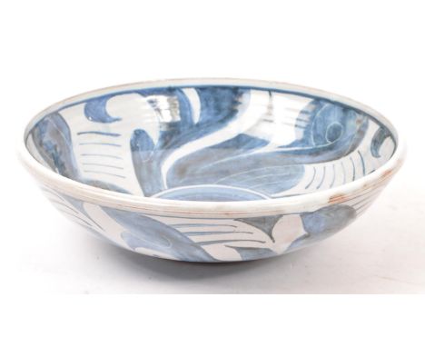Pat Birks (contemporary) - A pottery ceramic hand painted fruit bowl. In blue and white tones with geometric patterns, singed