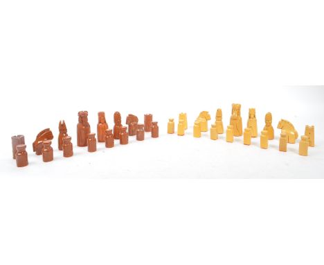 A ceramic handmade terracotta and stoneware colouring chess set with glazed finish and orange felt to base of figures. No mis