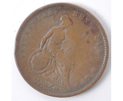 An 1826 George IV British copper half penny coin. Featuring the bust of George IV to the obverse, while to the reverse displa