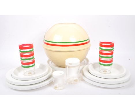 Guzzini - A mid 20th century circa 1970s Guzzini picnic hamper sphere. The picnic set in the form of a sphere in a cream colo