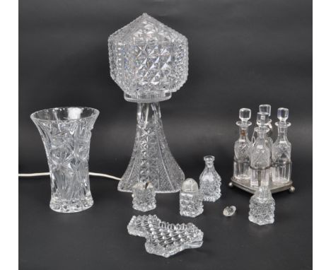 A 20th Century cut glass electric crystal table lamp light comprising of base and shade, the base of square form tapering to 