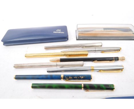 A large collection of 20th century ballpoint and fountain pens. The collection to include examples from Ronson, Osmiroid, Uni