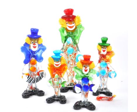 A collection of five studio art glass Murano clown figures. Each on black feet in standing position, having millefiori manner