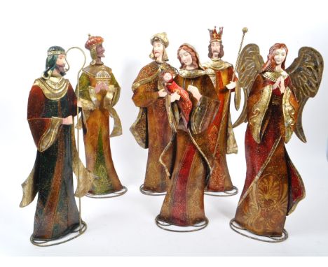 A collection of religious figures ornaments Christmas decorations. To include some members of the Nativity. Three wise man, a