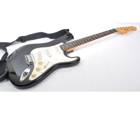 Squier by Fender - A circa 2000 Squier by Fender Bullet strat stratocaster six string electric guitar. The guitar having a bl