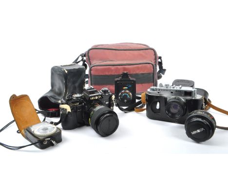 Minolta / Zorki - Two 20th Century cameras, the Zorki a&nbsp;4k 35mm rangefinder camera with jupiter 8 5ml f2 lens. The Minol