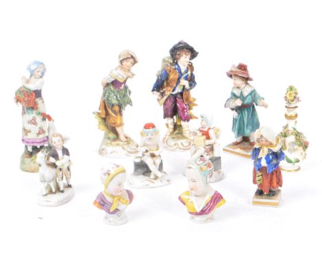 Capodimonte - A collection of eleven 19th Century china porcelain Capodimonte figurines comprising of a young boy with goat, 