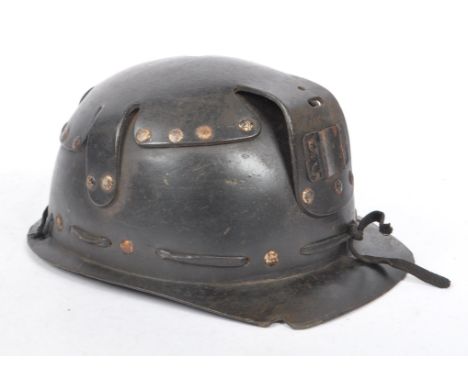 A mid Century vintage leather coal miners safety helmet with number 145 etched into the underneath of the brim. Measuring app