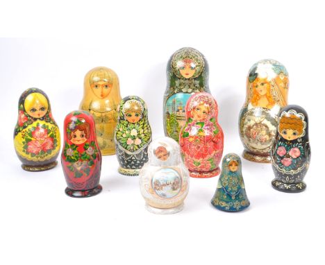 A collection of late 20th century and later Russian USSR folk art Matryoshka graduating nest of dolls. With ornate hand paint