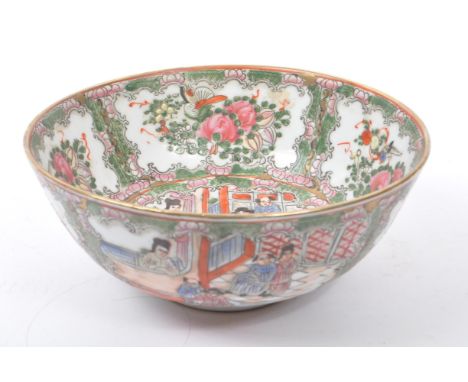 A 19th century Chinese porcelain china hand painted famille rose bowl having central oriental scene of figures surrounded by 