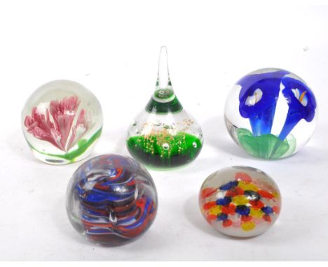 A collection of five vintage 20th century glass paperweights. The paperweights to include millefiori, bubble control, canewor