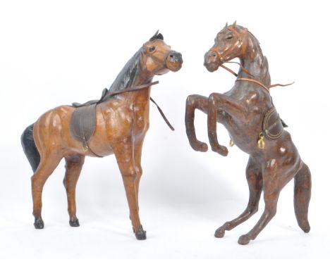 Manner of Liberty &amp; Co - Two 20th Century vintage large brown leather horse models in the style of Liberty &amp; Co, one 