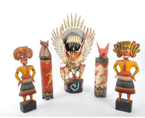 A collection of vintage 20th century grotesque wooden carved figures. One large hand painted religious figure / theatre prop,