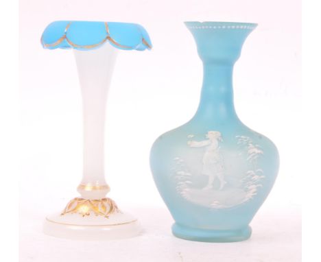 Mary Gregory - A Victorian 19th Century Mary Gregory opaque coloured blue glass vase having white enamel cameo design of youn