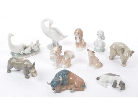Lladro -&nbsp; A collection of late 20th century / early 21st porcelain china animal figures. Comprising of a buffalo, elepha