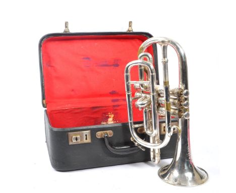 Boosey &amp; Co. - An early 20th century Boosey &amp; Co light valve cornet. The cornet in silver tone white metal. Housed in