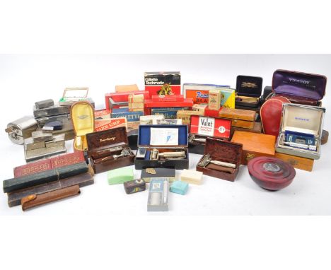 A large collection of vintage 20th Century razors to include miniatures and cut throats. Comprising of manufacturers such as 
