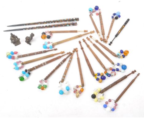 A collection of 19th &amp; 20th century carved lace bobbins to include bead adorned etc long with picks and others ware, Chin