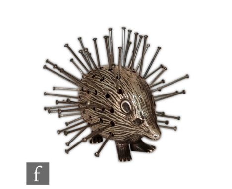 A silver hallmarked pin cushion modelled as a hedgehog, Birmingham 1906, Adie &amp; Lovekin Ltd, height 4cm, length 4cm. 