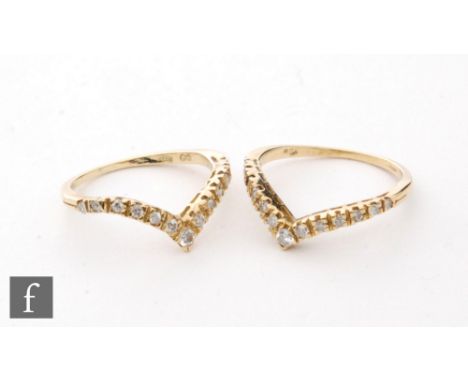 Two 18ct diamond set wishbone rings each set with thirteen stones, total weight 4g, ring size L. (2) 