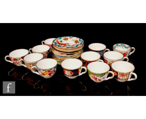 A set of twelve Royal Worcester Compton and Woodhouse miniature teacups and saucers each decorated with previous Worcester pa