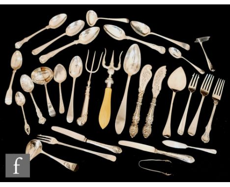 A parcel lot of assorted hallmarked silver and continental flatware to include dessert spoons, silver handled knives and fork