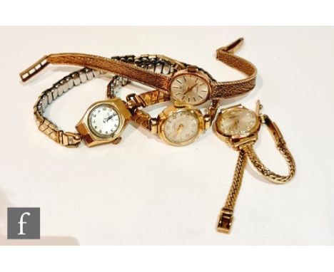 A 9ct hallmarked lady's Marvin Revue quartz wrist watch, batons to an oval dial and integral woven bracelet, with a similar B