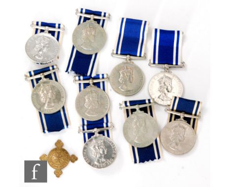 Nine Elizabeth II Police Long Service and Good Conduct medals to Const John A Glasse, Const John S Miles, Sargt Gary J Norgro