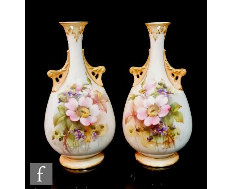A pair of Royal Worcester Hadleys shape 288 twin handled vases panel decorated by Cole with hand painted dog roses and violet