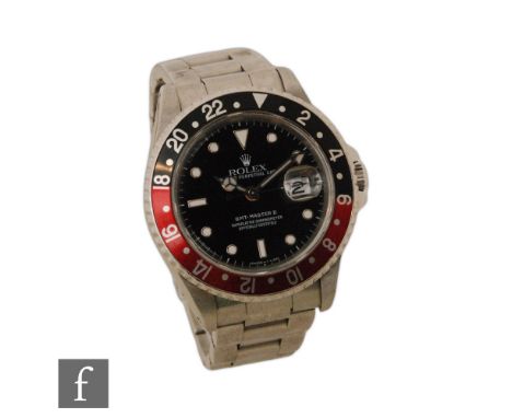 A gentleman's stainless steel wrist watch, Rolex GMT Master II, 16710, 'Coke' bezel, black dial with sweep second hand, case 