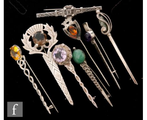 A collection of Victorian and later Scottish silver and white metal brooches/kilt pins, to include eight various examples, mo