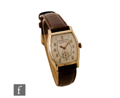 A gentleman's gold plated Bulova manual wind wrist watch, Arabic numerals to a rectangular dial, length 35mm, to a brown leat