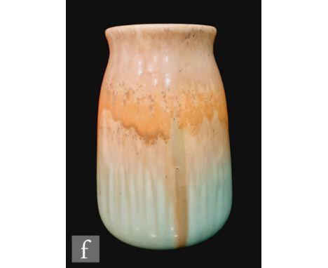 A large Ruskin Pottery crystalline barrel vase decorated in a tonal blue green to orange to blue, incised W Howson Taylor, im