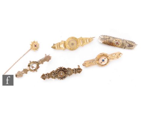 Five early 20th Century 9ct bar brooches to include stone set and plain examples, with a 9ct stick pin, total weight 11.5g, v