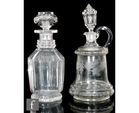 A clear crystal claret jug circa 1900, of tapering cylindrical form with two basal rings and another ring at shoulder, with h