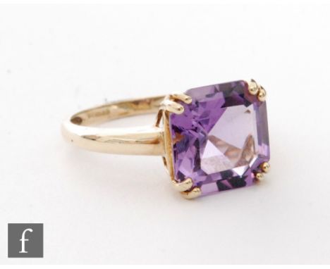 A 9ct hallmarked amethyst single stone ring, square cut claw set stone, weight 3g, ring size P. 