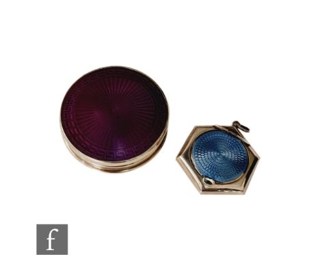 A hallmarked silver hexagonal small compact with blue gillouche enamel decoration to hinged cover, diameter 3.5cm, with a sim